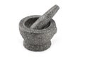 Stone mortars and pestles as cooking tools. Royalty Free Stock Photo