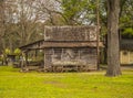 Old rustic style shed and wagon in the country background Royalty Free Stock Photo