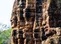 Stone murals and statue Bayon Temple Angkor Thom. Angkor Wat the Royalty Free Stock Photo