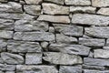 Stone natural rock texture background. Modern grunge wall castle made old granite of blocks. Wall rough old piece rock of mountain Royalty Free Stock Photo