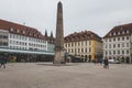 The stone obelisk on the Market Square in the town of Wurzburg, Germany