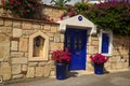 Stone old building house with blue wooden vintage door and windows. Bodrum, Turkey Royalty Free Stock Photo