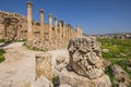 a stone ornament of column base on the ruins of the city of Jerash in Jordan Royalty Free Stock Photo