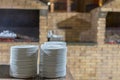 stone oven in the restaurant. Outdoor restaurant with stone stove. Brick oven for baking bread. A traditional oven for cooking and Royalty Free Stock Photo