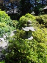 Stone Pagoda path lanterns in bright sunshine