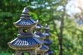 Stone pagodas lanterns as traditional asian architecture, found in Buddhist temples and Chinese gardens. Lantern as rock garden