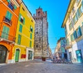 The stone Pallata Tower from Vicolo due Torri street, Brescia, Italy
