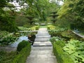 Stone passage in Castillon garden in Normandy in France.