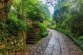 Stone path with staircase and trees in Hangzhou, China