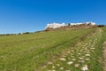 Stone path to Spis Castle against clear blue sky, Slovakia.
