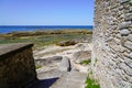 Stone pathway stairs to access water sea in low tide in talmont vendee french city