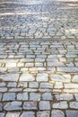 Stone paved footpath, cobblestone pathway background texture