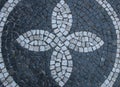 Stone-paved street with a flower pattern.