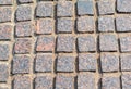 Stone pavement of multicolored granite close up Royalty Free Stock Photo