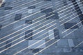 Stone pavement with rectangular tiles and long diagonal shadows forming abstract geometric pattern in natural daylight Royalty Free Stock Photo
