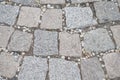 Stone pavement texture. Granite cobblestoned pavement background. Abstract background of old cobblestone pavement close-up.