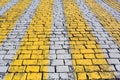 Stone pavement texture with pedestrian crossin Royalty Free Stock Photo