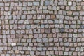 Stone paving ancient crypt in Prague, against the background of Christmas trees and sky