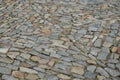 Stone paving medieval, granite, gneiss, small rectangular shape brushed old stones cobblestone paving, path, sidewalk gray brown c