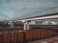 Stone pedestrian bridge over the railroad tracks Royalty Free Stock Photo