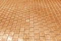 Stone pedestrian walkway patter in orange tone Royalty Free Stock Photo
