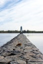 Stone pier to the lighthouse lake Ladoga Royalty Free Stock Photo