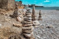 A stone pile on the sea beach. Stone tower closeup. Royalty Free Stock Photo