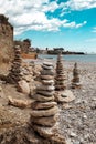 A stone pile on the sea beach. Stone tower closeup. Royalty Free Stock Photo