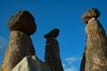 Stone pillars with top hats. Royalty Free Stock Photo