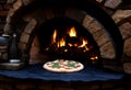 Stone pizza oven and pepperoni pizza close up Royalty Free Stock Photo