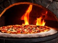 Stone pizza oven and pepperoni pizza close up Royalty Free Stock Photo