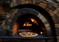 Stone pizza oven and pepperoni pizza close up Royalty Free Stock Photo