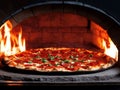 Stone pizza oven and pepperoni pizza close up Royalty Free Stock Photo