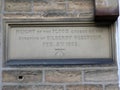 Stone plaque indicating the 1852 flood height in Holmfirth