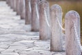 Stone pole and chain fence. Royalty Free Stock Photo