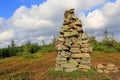 Stone pyramid on mountain top Royalty Free Stock Photo