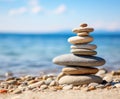 Stone pyramid. Pebbles balance pile, harmony zen stones, balance stack, sea pebble pyramid on shoreline, relaxation