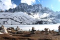 Stone pyramids cairns on the coast of lake in Himalayas Royalty Free Stock Photo