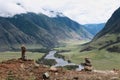 Stone pyramids in river valley Chulyshman. Natural landscape Republic Altai, Russia, summer day. mountain in clouds Royalty Free Stock Photo