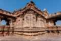 Stone reliefs on walls of the Hindu temple in India. Architecture of 7th century with carved walls in Pattadakal