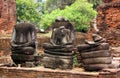 Stone remains of Buddha sculptures at Wat Phra Sri Sanphet. Ayutthaya, Thailand. Royalty Free Stock Photo