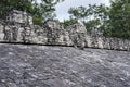 The stone ring on sloping side of the Ball Court at the Mayan Co