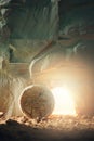 Stone is rolled away from empty grave on Easter morning. Jesus Christ resurrection. Empty tomb of Jesus with light. Born Royalty Free Stock Photo