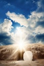 The stone rolled away from the entrance of empty tomb with sunlight bursting through, symbolizing Easter and the resurrection of Royalty Free Stock Photo