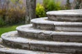 stone round steps in front of an old building