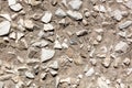 Stone rubble in the concrete wall as background Royalty Free Stock Photo