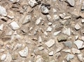 Stone rubble in the concrete wall as background Royalty Free Stock Photo
