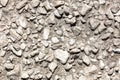 Stone rubble in the concrete wall as background Royalty Free Stock Photo