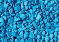 Stone rubble painted with blue paint. Background