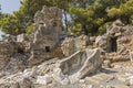 Stone ruins of houses and the street of the ancient city of Phaselis.